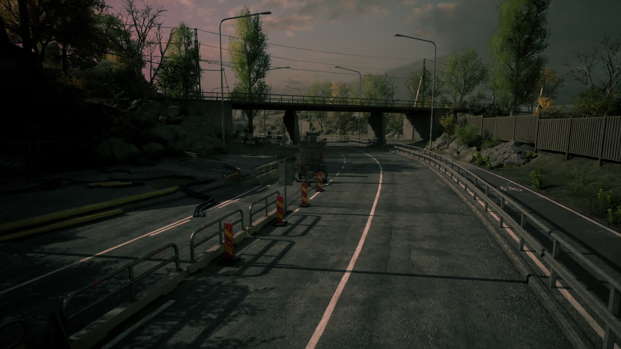 Road construction project on a highway near a bridge in a mountainous area