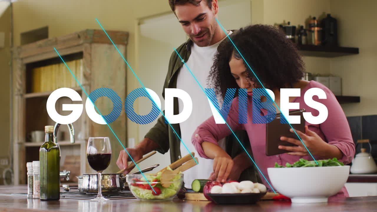 Animation of good vibes text over smiling diverse couple preparing food