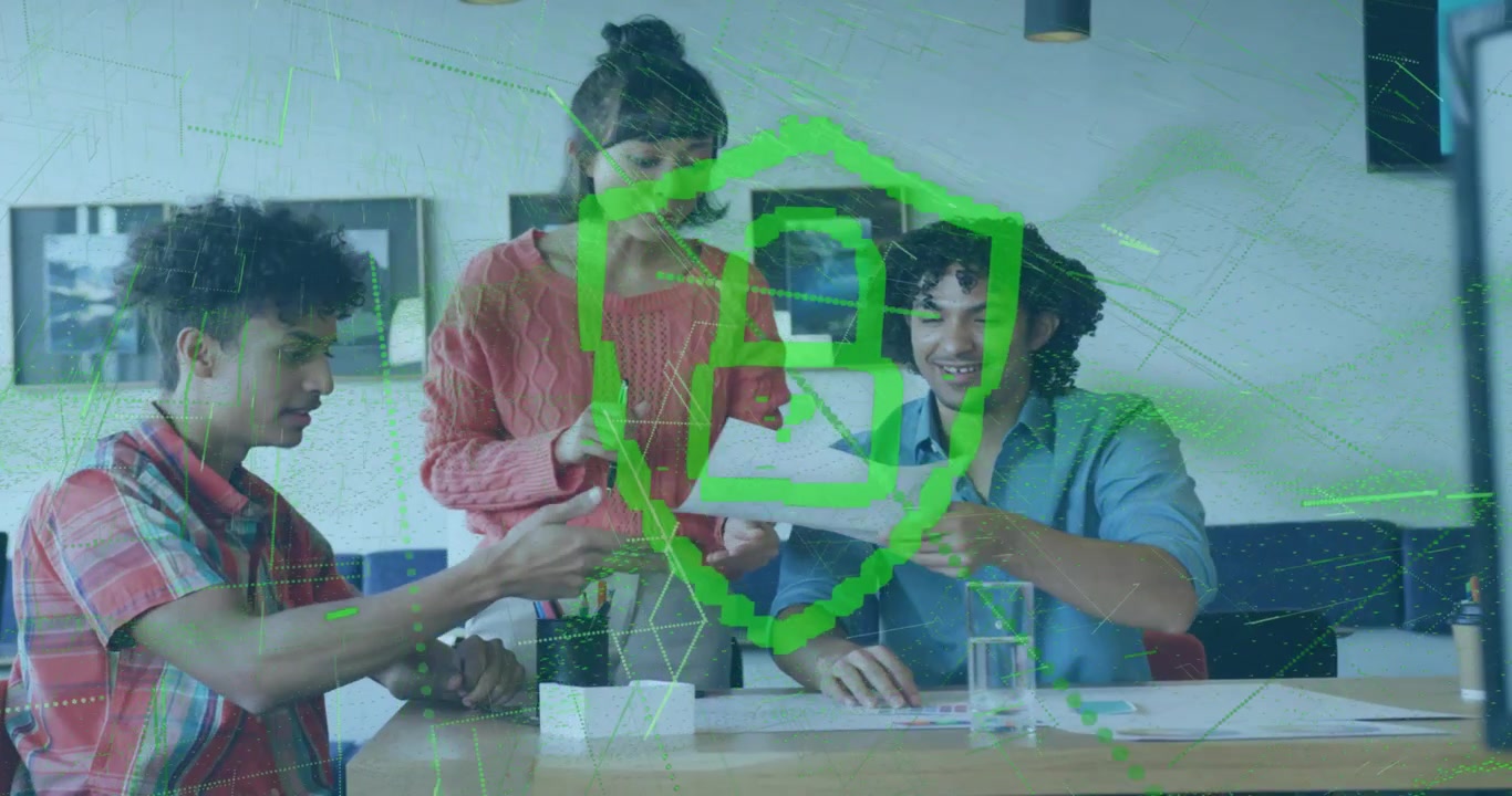 Diverse Team Collaborating on Project in Modern Office with Digital Security Overlay