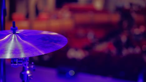 a cymbal's luster on the vibrant stage