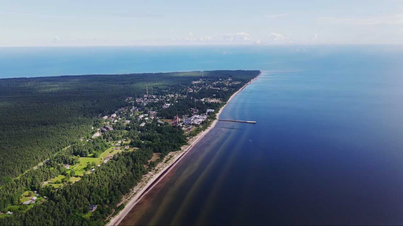 4K footage of Kolka Cape, showcasing shoreline while the drone lowers altitude