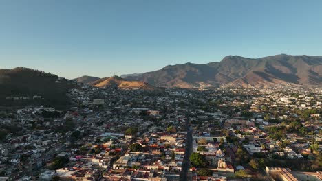 Aerial-View-of-Oaxaca-Mexico,-Downtown-Residential-Neighborhood-at-Sunset,-Drone-Shot