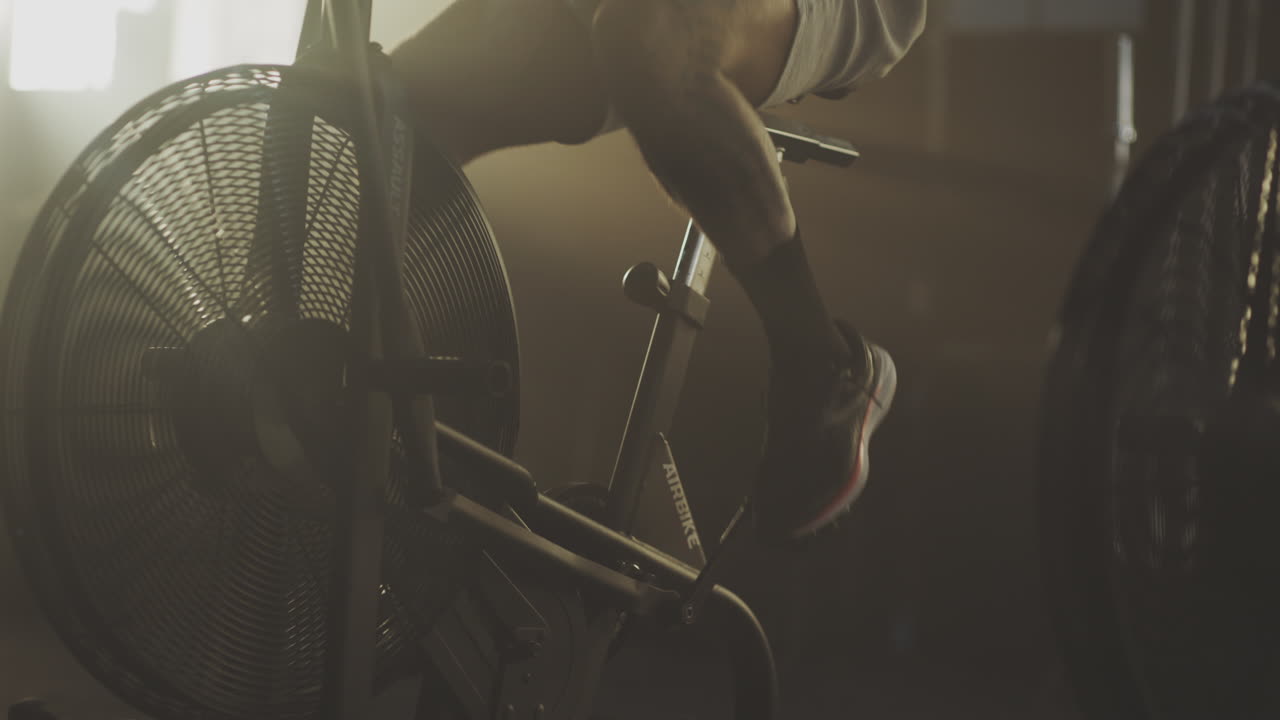 Person Exercising on an Air Bike