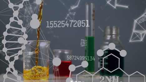 animación de la cadena de adn girando sobre copas de medidas químicas