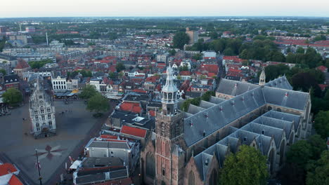 Gothic-Exterior-Of-Sint-Janskerk-Church-Near-The-Market-Square-In-Gouda,-South-Holland,-Netherlands