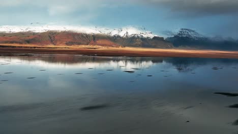 Scenic-Reflections-On-Icelandic-Fjord-In-South-Iceland---aerial-drone-shot