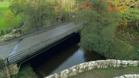 north york moors, yorkshire, river esk drone footage, above glaisdale beggars bridge, phantom 4 aerial - autumn clip 9