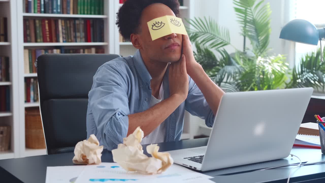 Overworked Man with Sticky Note Eyes