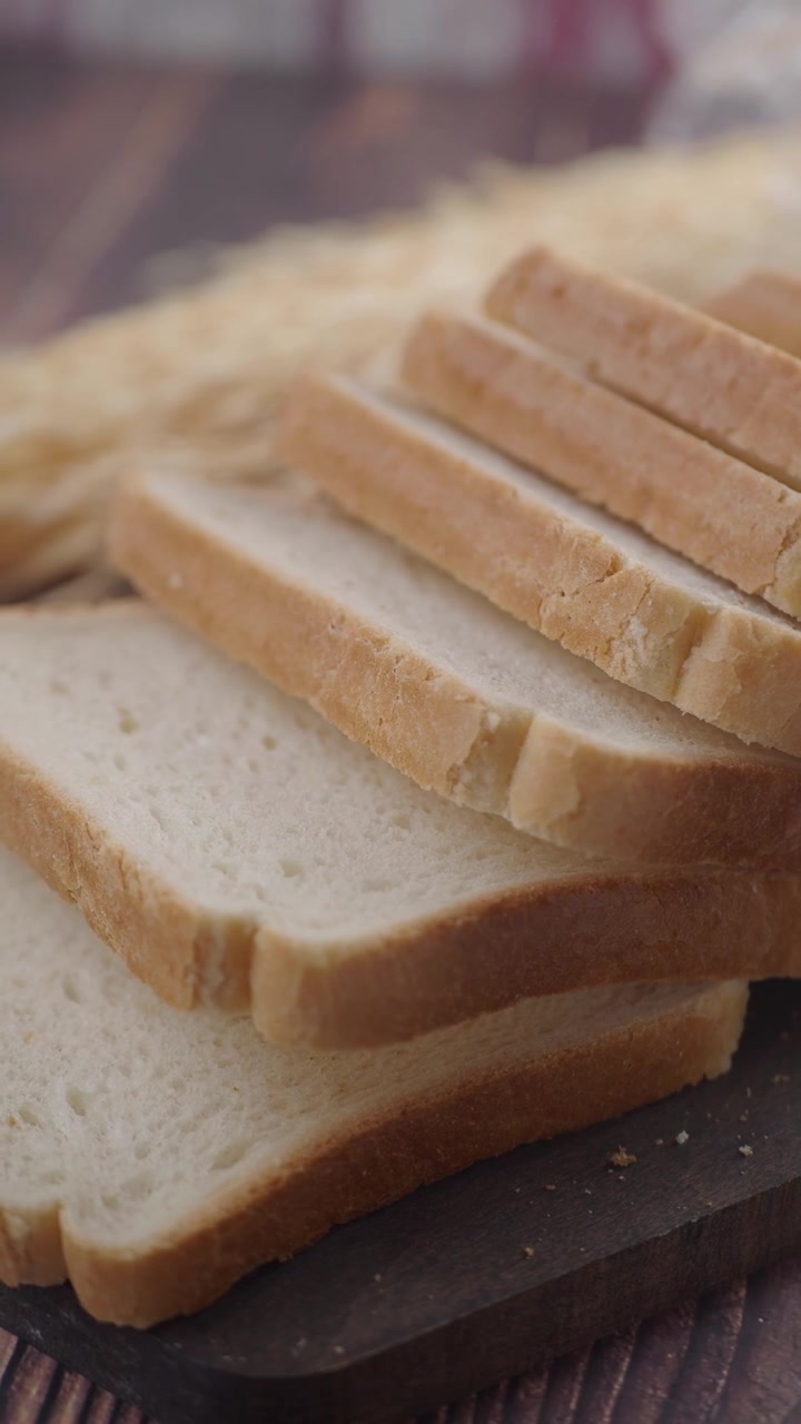 Stack of Fresh White Bread Slices with Wheat and Milk