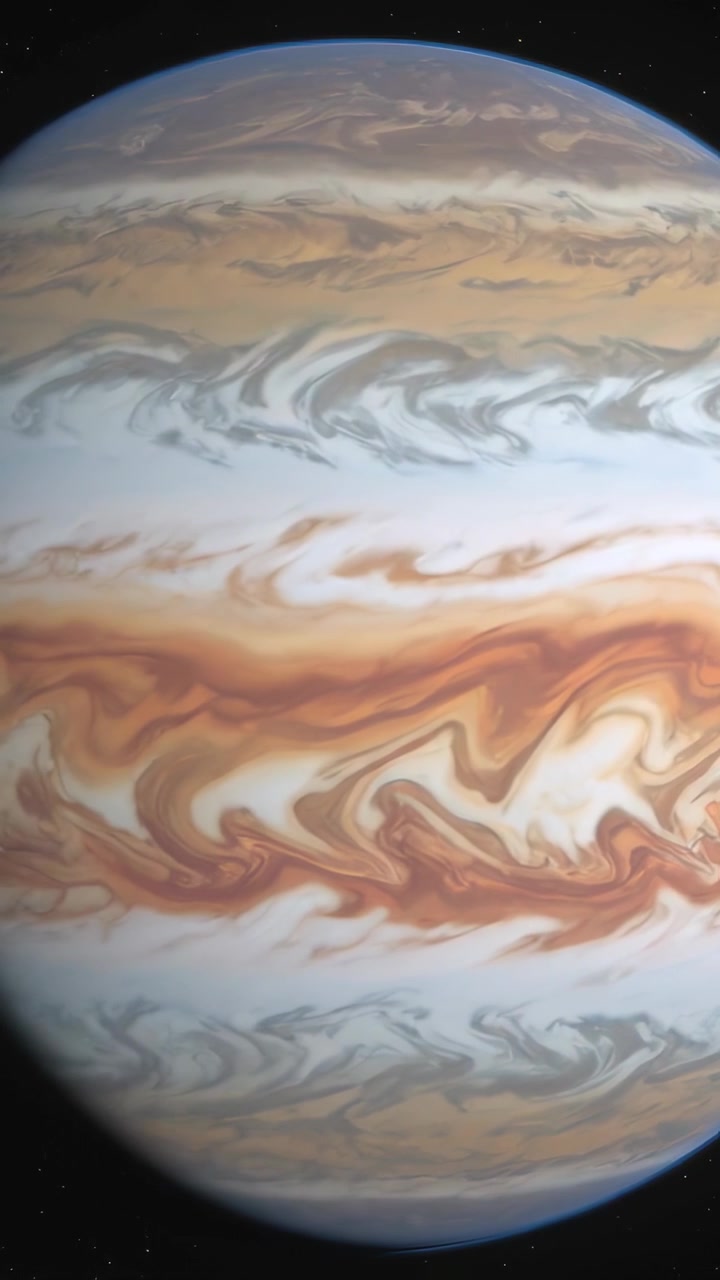 Vertical video: Rotating gas-giant disk showing band drift, causing small shadow to shift in space