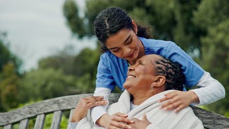 Happy-woman,-nurse-and-patient-hug-on-park-bench