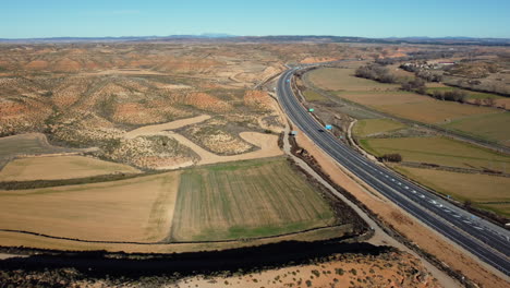 aerial view of highway through rural landscape