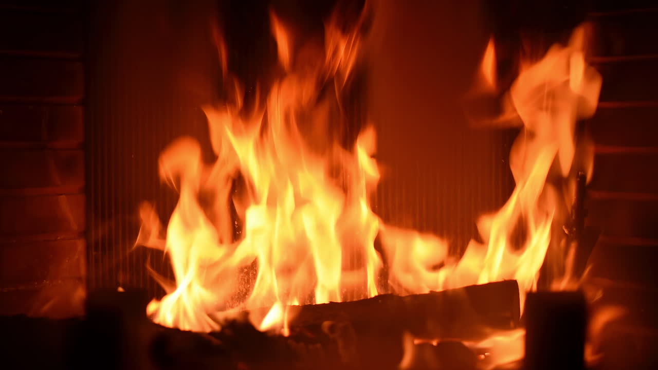 Close up of a wood log burning in a chimney