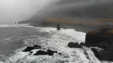 aerial footage over a black beach in djupavogshreppur, iceland-10