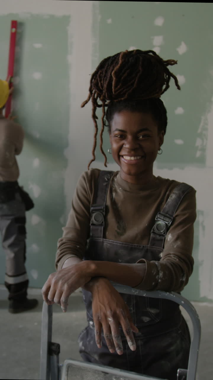 Construction Workers Renovating Building