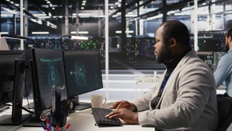 vertical video cheerful data center admin pleased after finalizing software upgrade