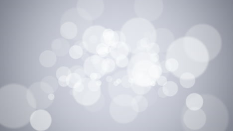 partículas redondas blancas voladoras con brillos en un degradado brillante de moda