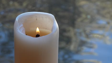 shot of flower and candle used for a funeral