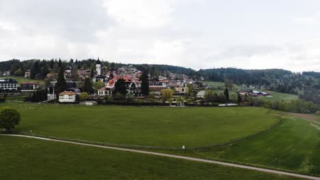 Wide-establishing-aerial-view-of-Oberbozen-sitting-in-Italy's-isolated-countryside