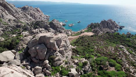 aerial forward view over sea landscape and white rocks