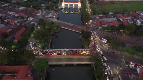 aerial perspective of the busy traffic in indonesia, east java, surabaya at night