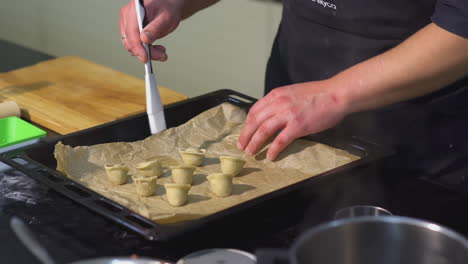 chef preparing small pastries