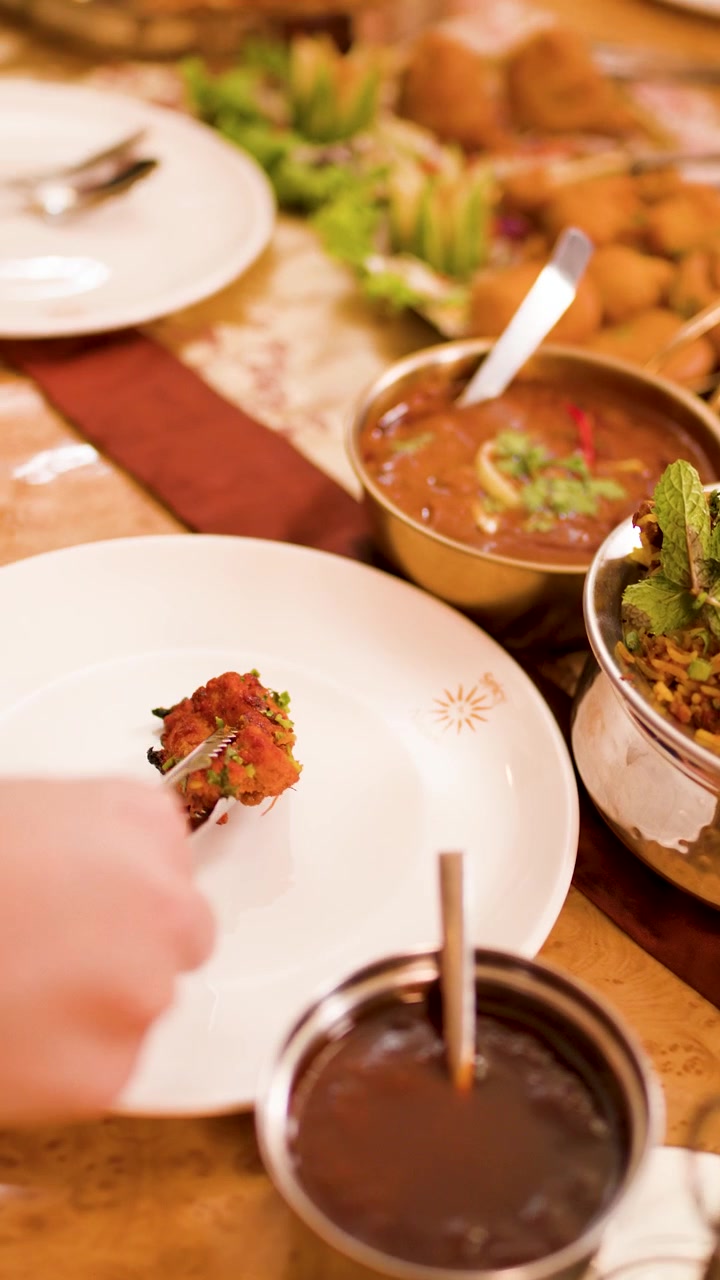 Serving Tandoori Chicken on a Plate in an Indian Restaurant