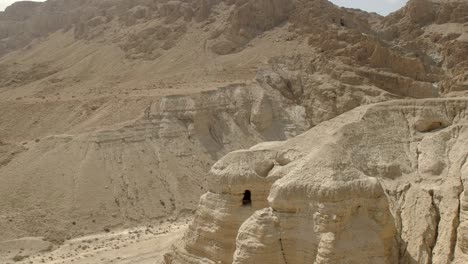 wide panning shot of cave 4q at qumran in israel