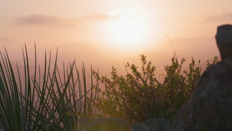 sunsets on a mountain range on the california coast.