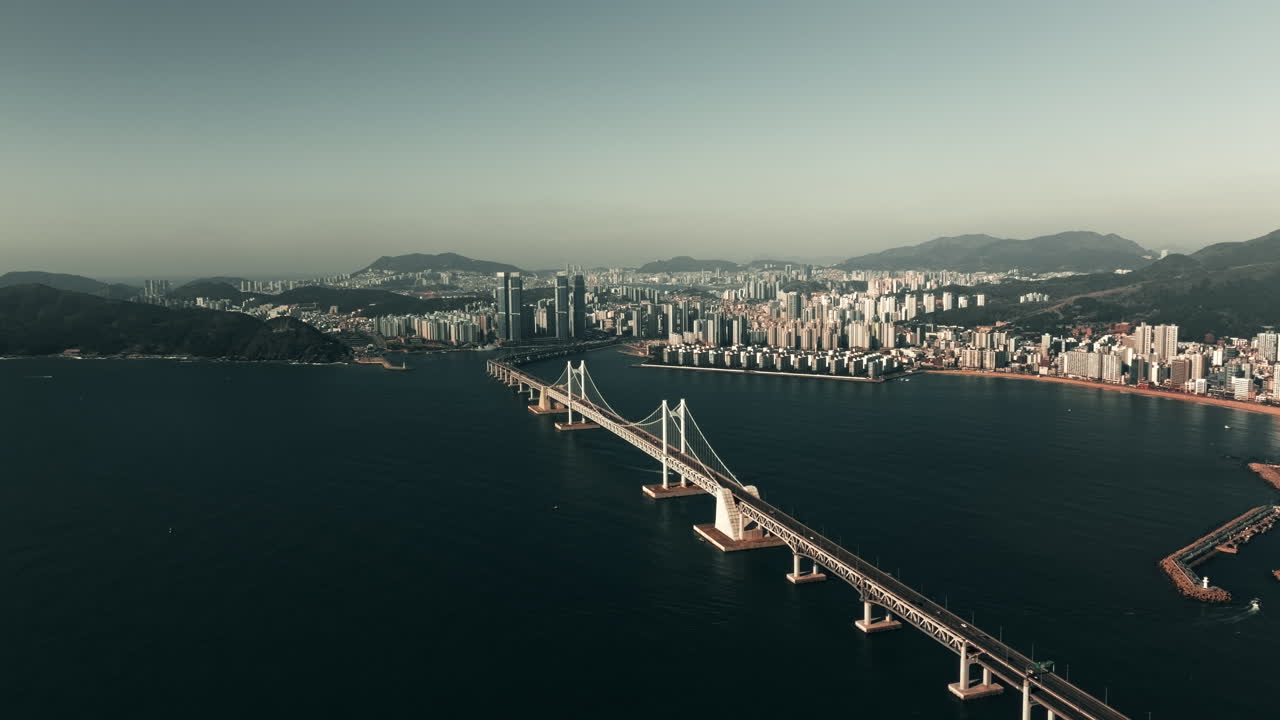 Aerial View of a City Bridge Over a Bay