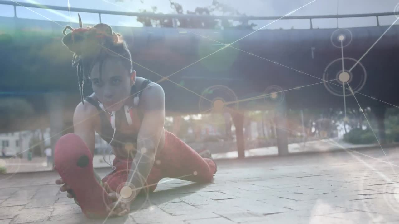 red de conexiones contra una mujer afroamericana que realiza ejercicios de estiramiento en el parque