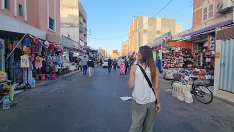 walking through a bustling street market