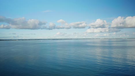 4k landscape panoramic view shot of the beautiful southern english coast line, at old harry rocks, in dorset, england, on a sunny day