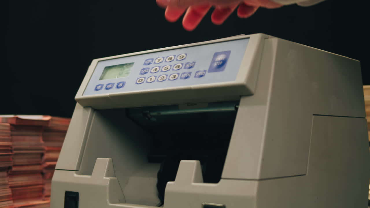 Specialised police officer Counting dollar banknotes in crime lab, conceptual image. High quality 4k footage