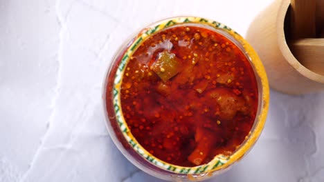 spicy indian pickle in a glass jar