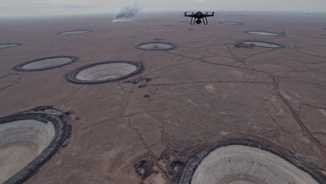 drone surveying a large-scale open pit mine