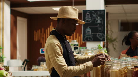 African-american-seller-preparing-local-farmers-market-products