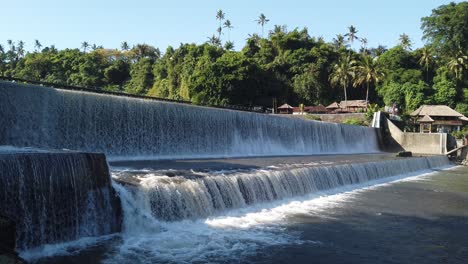 panoramic of bali waterfall, indonesia, falls in tropical landscape, water flowing at klungkung regency, tirai air terjun tukad unda