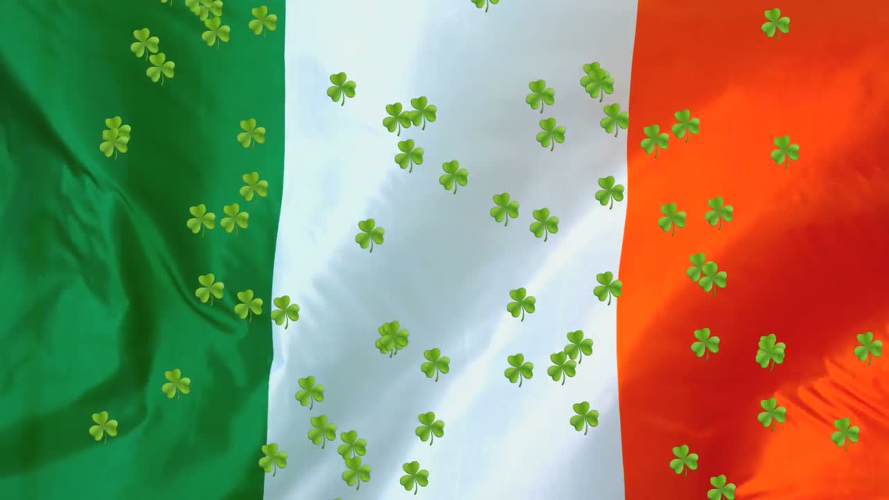 animación de tréboles que caen con la bandera irlandesa en el fondo para el día de san patricio