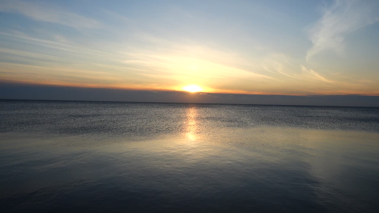 Sunset over the sea. Shooting in the evening