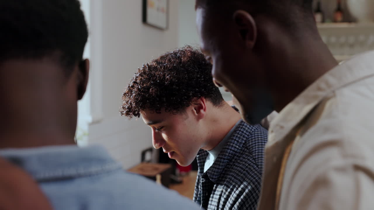 Group of Friends Conversing and Laughing Indoors