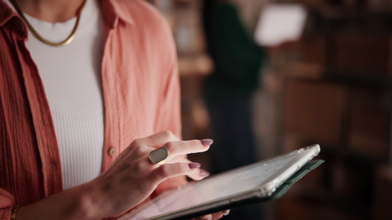 Woman Using Digital Tablet for Inventory Management