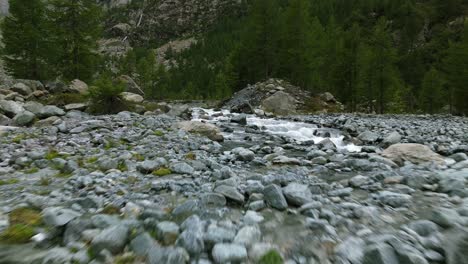 val ventina dry riverbed with shallow water stream