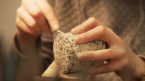 cleaning - filing of cylinder from concrete - detail shot