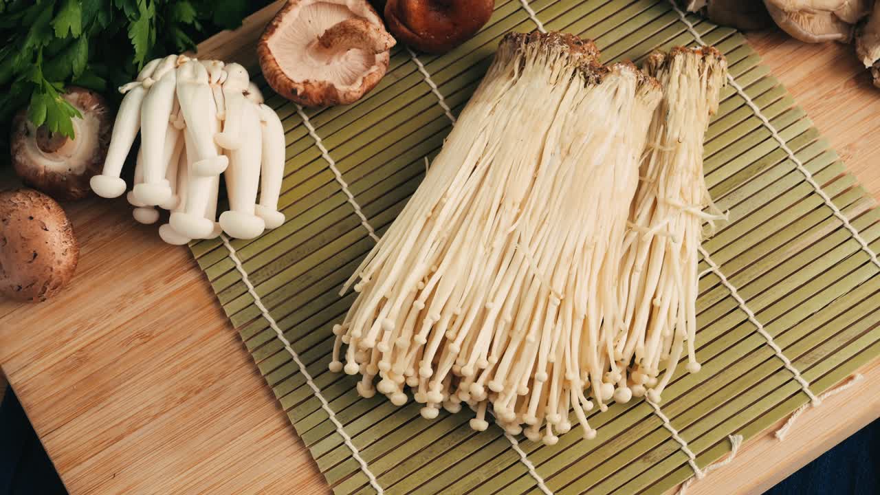 Various Mushrooms on a Wooden Cutting Board