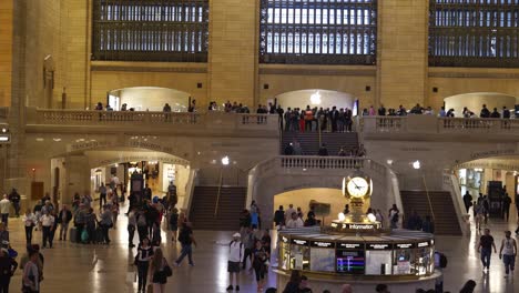 shot of visitors pausing to admire the grand architecture and historic details of grand central terminal