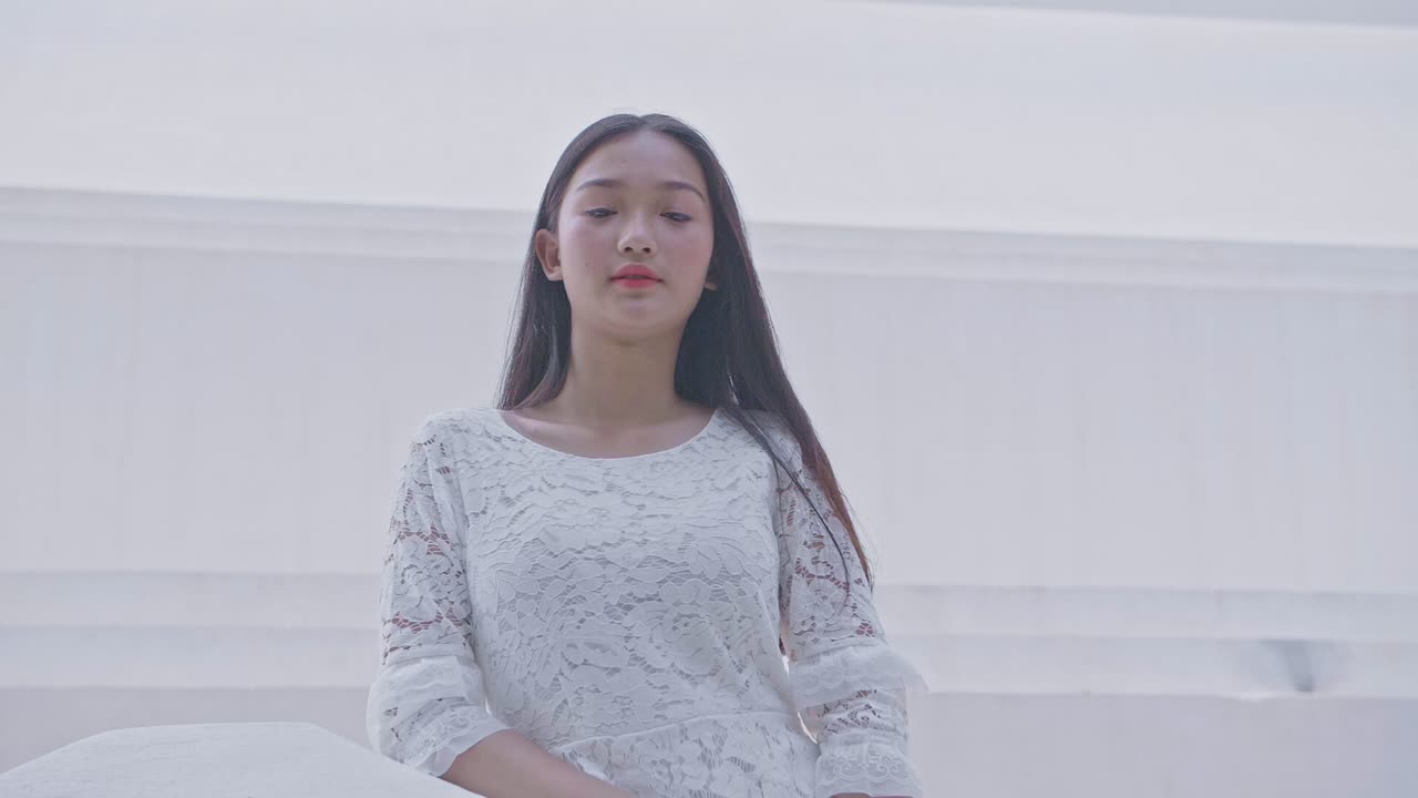 Young Asian Girl Pose And Looking At Camera, Slow Motion