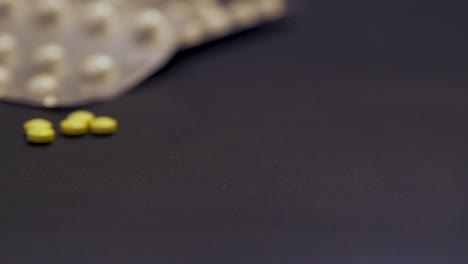 close-up of various pills and capsules in blister packs