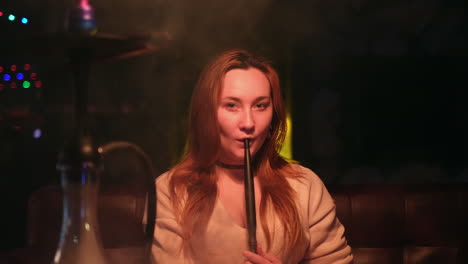 woman smoking hookah