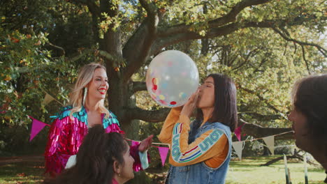 friends having fun at a picnic in the park